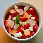 Salad with tomatoes, strawberries, preserved lemons and cheese
