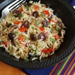 Orzo salad with olives, veggies and pine nuts