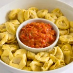 Tortellini wiht roasted bell pepper and onion appetizer