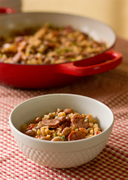 Beans and rice made with pintos, andouille sausage, and roasted red chiles. mjskitchen.com