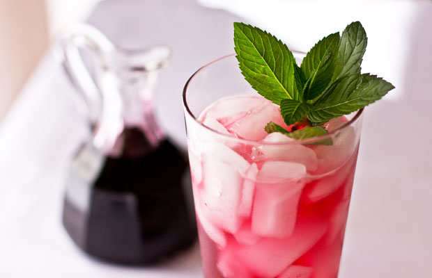 A refreshing beverage made with hibiscus mint simple syrup and sparkling water mjskitchen.com @MJsKitchen