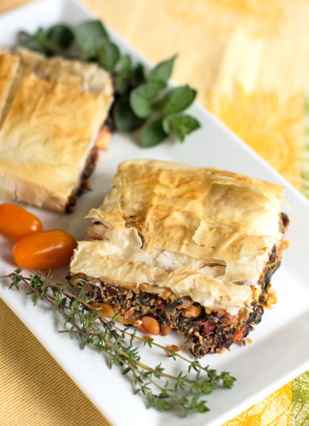 A hearty vegetarian meal of Swiss chard, pine nuts, ricotto and feta wrapped in phyllo dough #phyllo #Swiss #chard #vegetarian @mjskitchen