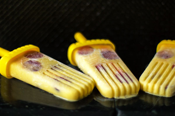 Pineapple Coconut Popsicles with fresh cherries - just 3 ingredients. mjskitchen.com