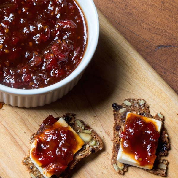 This is a spicy jam designed to be spread on soft cheese and crackers, or use it to top off turkey burgers or sausage.