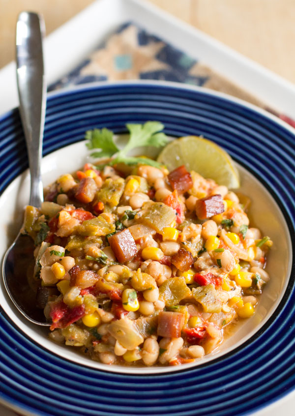 A hearty one pot meal with navy beans and green chile, corn, tomatoes and a host of other goodness. #green #chile #beans @mjskitchen