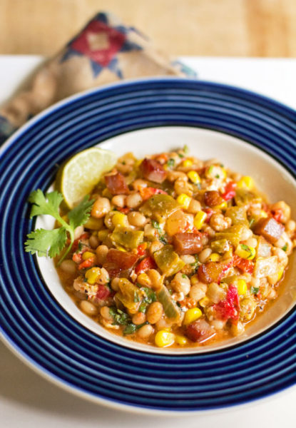 A hearty one pot meal with navy beans and green chile, corn, tomatoes and a host of other goodness. #green #chile #beans @mjskitchen