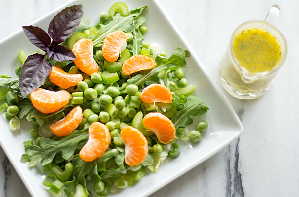 A simple salad with arugula, fresh peas, and orange | mjskitchen.com