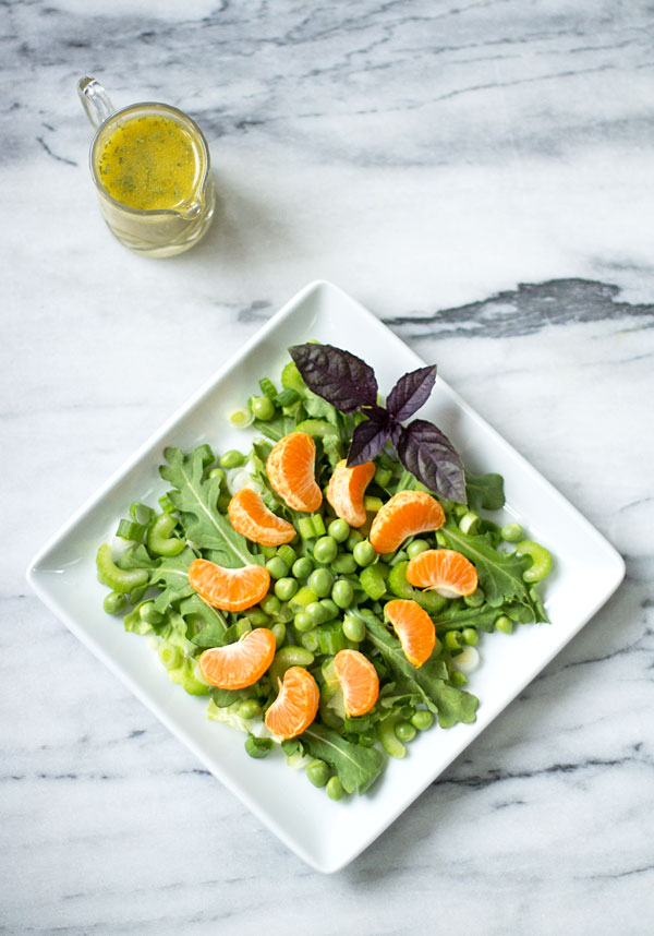A simple salad with arugula, fresh peas, and orange #salad #arugula #sweetpea @mjskitchen.com