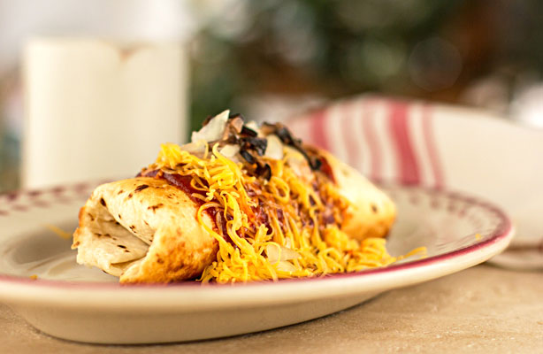 Breakfast Chimichanga filled with either egg and chorizo or egg and black beans, then smothered in NM red chile sauce | mjskitchen.com
