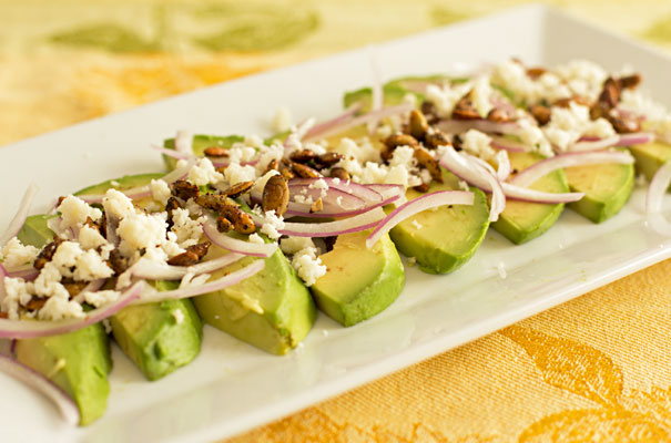 Avocado Onion Salad with sweet and spicy pepitas and cotija cheese. Serve as a starter or salad. | mjskitchen.com