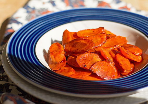 Red Chile Glazed Carrots, first cooked in tequila, then glazed with a touch of honey and New Mexico red chile sauce. #carrots #redchile @mjskitchen