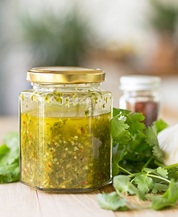 A chimichurri sauce that uses a combination of parsley and cilantro, and lots of garlic (a standard ingredient for chimichurri) #chimichurri #pebres #cilantro #parsley @mjskitchen