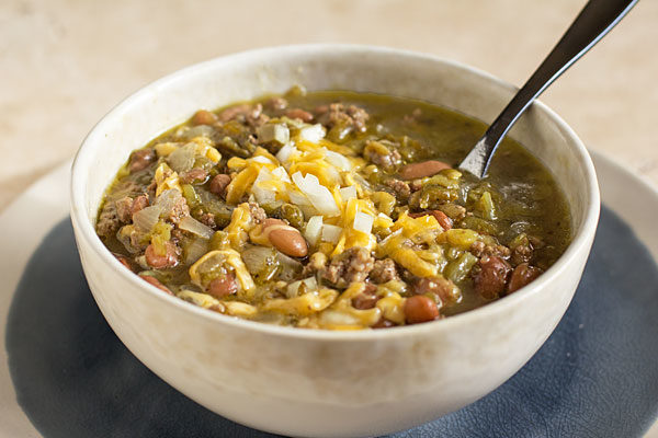 Green Chile Stew - A quick & easy stew with ground beef, lots of New Mexico green chile, and pinto beans. #greenchile #stew @mjskitchen