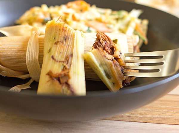 Smoked pulled pork tamales with barbecue sauce and dill pickles. It's like eating a BBQ sandwich. #barbecue #pulledpork #tamales @mjskitchen