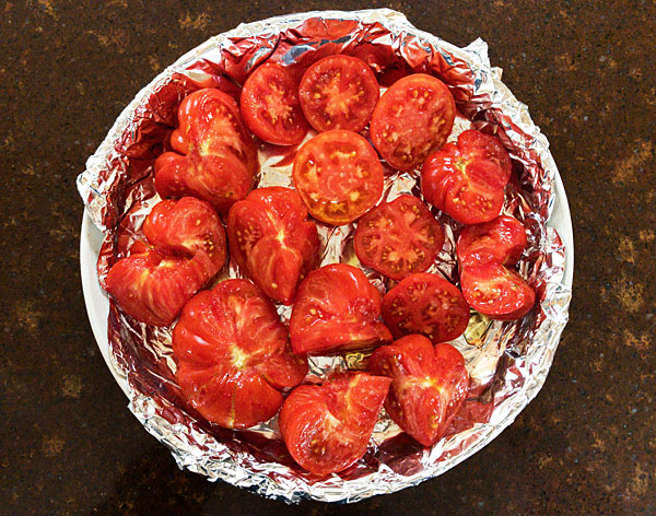 Tomato Confit is a simple and delicious way to enjoy fresh tomatoes. #tomatoes #confit #roasted @mjskitchen