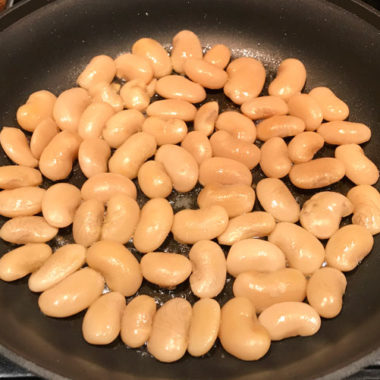Pan frying corona beans provides a crusty skin and creamy center #corona #beans @mjskitchen