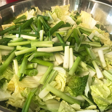 Large batch kimchi made with napa cabbage, scallions and a Korean Kimchi sauce. #napacabbage #kimchi @mjskitchen