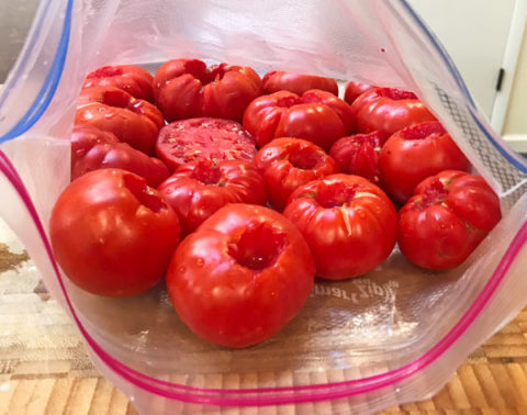 The easiest, hassle-free method of freezing tomatoes. #freezing #preserving #tomatoes @mjskitchen