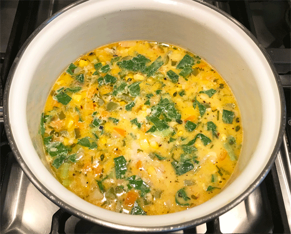 A hearty vegetable soup made with leftover broth from milk and butter boiled corn #soup #corn #vegetarian #leftover @mjskitchen