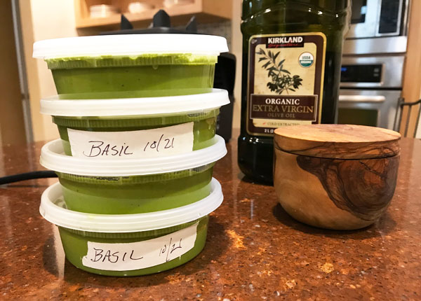 Basil puree made from fresh basil, a little parsley, oil, garlic and salt. Freeze and enjoy all winter. #basil #preserving #puree #pesto @mjskitchen