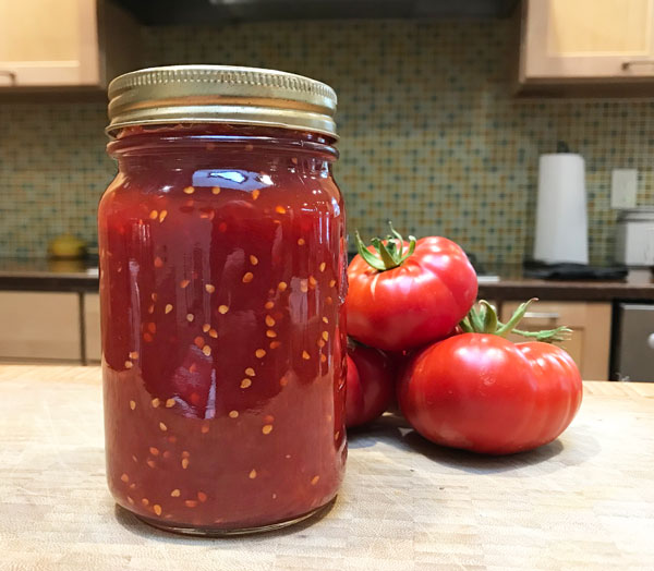 A sweet and savory jam with fresh tomatoes and New Mexico red chile sauce. #jam #tomato #redchile @mjskitchen