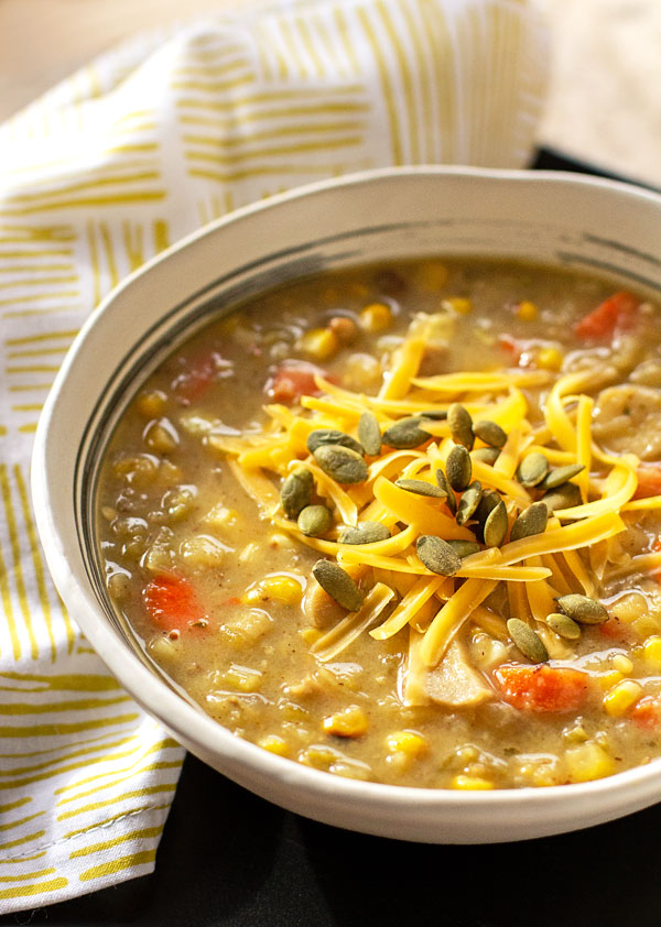 A hearty Hatch Chile Leek and Potato soup loaded up with carrots, corn and mushrooms. #soup #greenchile #leeks #vegetarian #glutenfree @mjskitchen