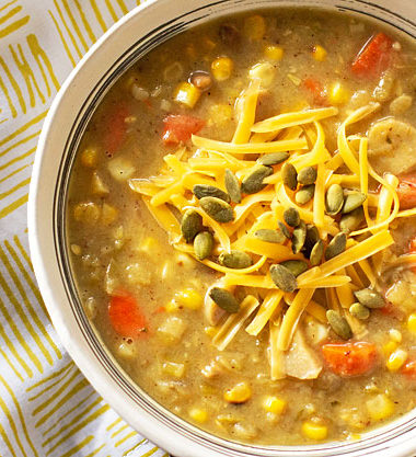 A hearty Green Chile Leek and Potato soup loaded up with carrots, corn and mushrooms. #soup #greenchile #leeks #vegetarian #glutenfree @mjskitchen